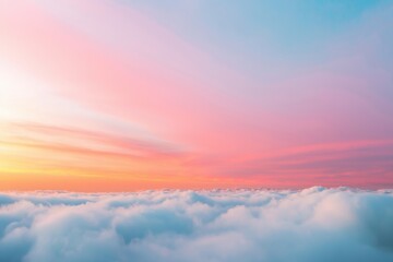 Obraz premium The sky is a stunning blend of pink and blue hues, with fluffy white clouds scattered throughout. The colors are vibrant and create a serene and peaceful atmosphere