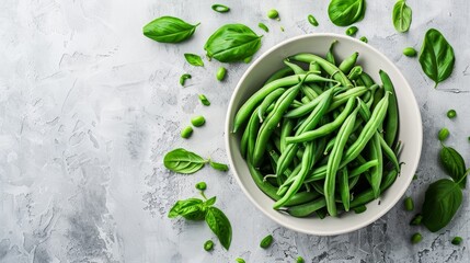 Obraz premium green beans in a bowl on a white background