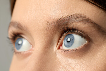 Obraz premium Closeup view of woman with blue eyes