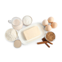 Making cinnamon rolls. Different ingredients for dough isolated on white, top view