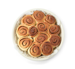 Freshly baked cinnamon rolls in baking dish isolated on white, top view