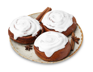 Tasty cinnamon rolls with cream and spices isolated on white