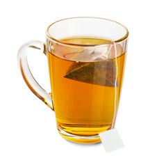 Tea bag in glass cup with hot drink isolated on white