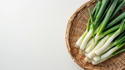 leek in a basket on a white background