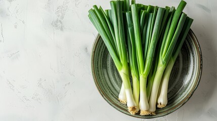 leek in a bowl on a white background