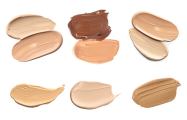Liquid foundation of different shades. Samples on white background, set