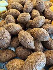Stack of fried kibbeh on display