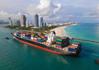 Container ship. Export and import. Cargo business. Port of Miami. Cargo ship with container in...