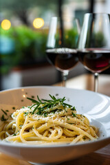 Gourmet Pasta Dish with Wine - An Exquisite Italian Culinary Experience