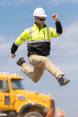 Builder man run fast to work. Engineer supervisor running outdoor. Supervisor jumping. Excited...