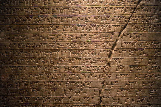Ancient cuneiform script carved into a stone tablet.