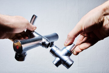 Tub and Shower Faucet Set, showing stainless steel parts being connected during installation in...