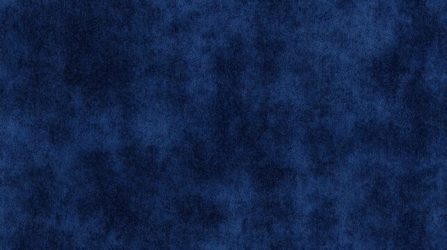 Experience the luxurious feel of a soft, dark blue suede fabric texture in exquisite detail.