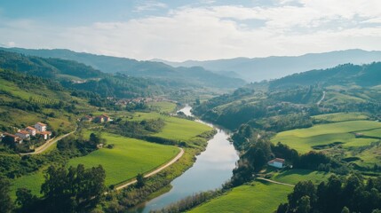 Tranquil river valley landscape with rolling hills and lush greenery