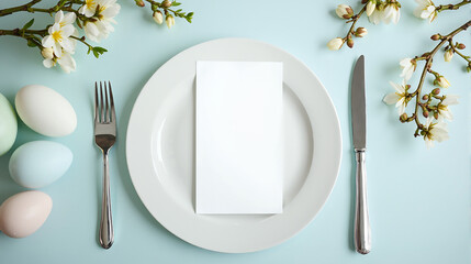 Elegant Easter dining table setting with blank white menu mockup laying on plate. Pastel blue eggs and spring flowers, top view. Restaurant invitation card template, mock up with copy space