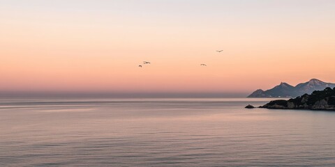 Sunset sunrise scene of the sea with pink sky. Sky sea and bird silhouette with mountain horizon background wallpaper