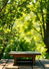 Naklejka premium Spring beautiful background with green juicy young foliage and empty wooden table in nature outdoor natural template with beauty bokeh and sunlight bokeh green bokeh green abstract background light br