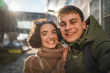 self portrait of young hugged couple boyfriend and girlfriend outdoor