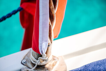 Securely Fastened: Flag Binding Rod on a Ship