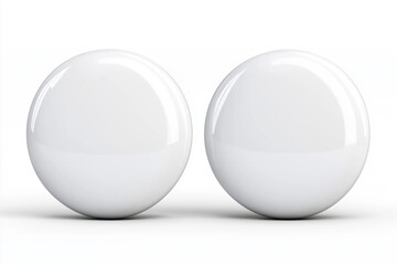 Two glossy white spheres arranged side by side on a stark white background