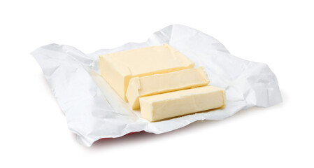 Cut block of fresh butter isolated on white