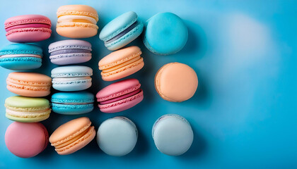 Obraz premium colorful macaroons isolated on blue background