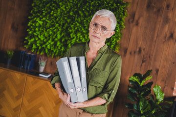 Photo of sad lady dressed shirt hold folder work modern office workplace workstation loft interior...