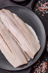 Herring fillet salted and marinated with salt, spices and oil