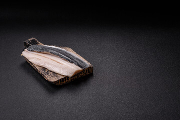 Herring fillet salted and marinated with salt, spices and oil