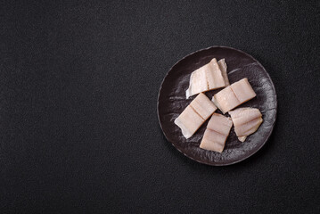 Herring fillet salted and marinated with salt, spices and oil