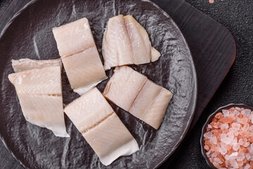 Herring fillet salted and marinated with salt, spices and oil