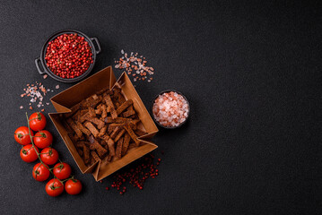 Crispy homemade brown bread crackers or croutons with seeds and grains