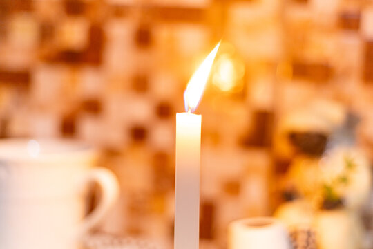 Offering for old black man, Umbanda Afro-Brazilian religion, Ax&eacute;, Orix&aacute;, Sarav&aacute;! The Umbanda ritual. Umbanda sculpture object. Candle, light, religion, African. Rio de Janeiro, Brazil.