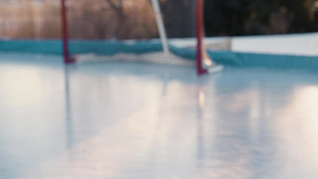 tilt to hockey net from canada flag in the ice