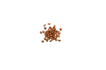 Brown peanuts scattered on plain surface for display