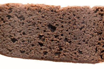 Moist chocolate cake slice showcasing rich texture and color