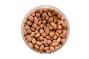 Dried peanuts in a clear container on a plain background