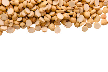 Dried chickpeas arranged on a plain background