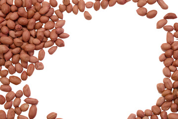 Raw peanuts scattered on a plain background