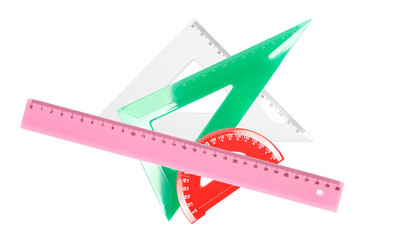 Colorful plastic triangle, ruler and semicircle, isolated on white background, top view