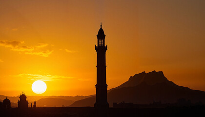 Silhouette of minaret at sunset, spiritual tranquility