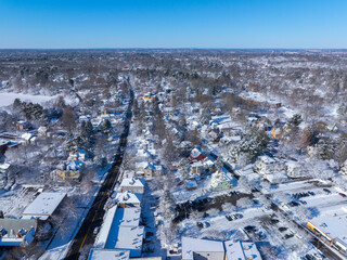 Newton Centre historic village aerial view in winter on top of Centre Green in city of Newton, Massachusetts MA, USA. 