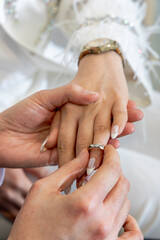 bride and groom holding hands