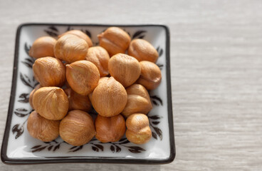 Close up photo of hazelnuts, selective focus.