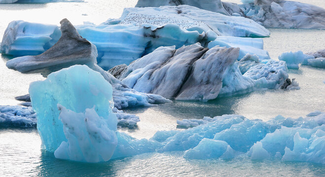 blue icebergs in polar region