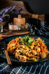 Fried chicken pieces with vegetables.