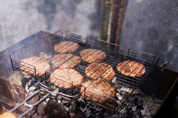 Cooking burgers on grill