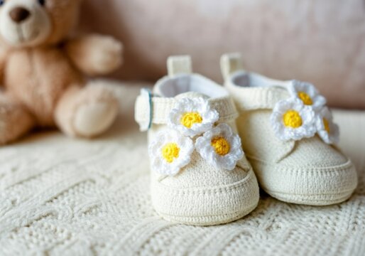 Adorable baby shoes with floral design, perfect for newborn photography