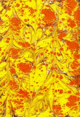 Abstract background with autumn leaves. Ebru art illustration in yellow and orange colors.