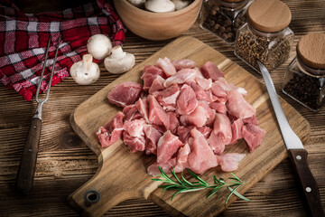 Raw meat diced for stew.